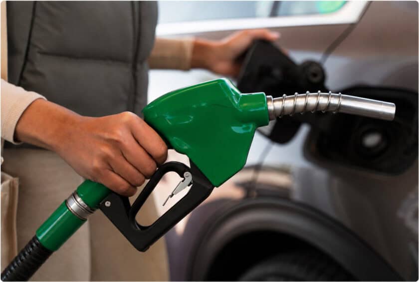 A green gas pump handle