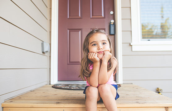 Girl on front porch