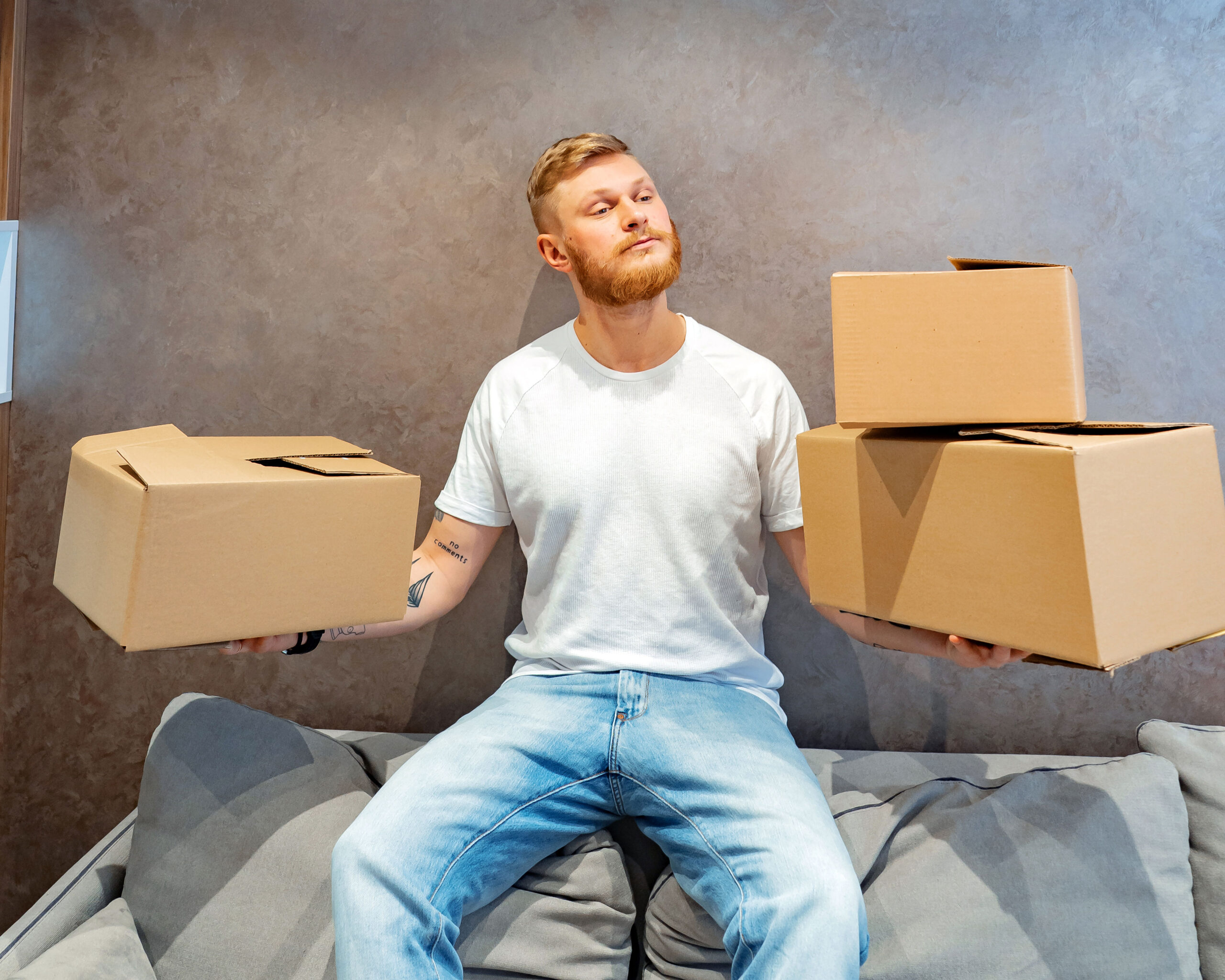 Joseph holding boxes