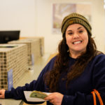 Happy woman inside branch