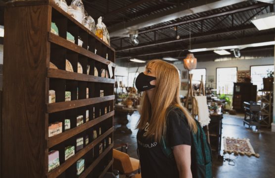 woman with mask shopping