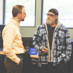 Banker talking to an older man