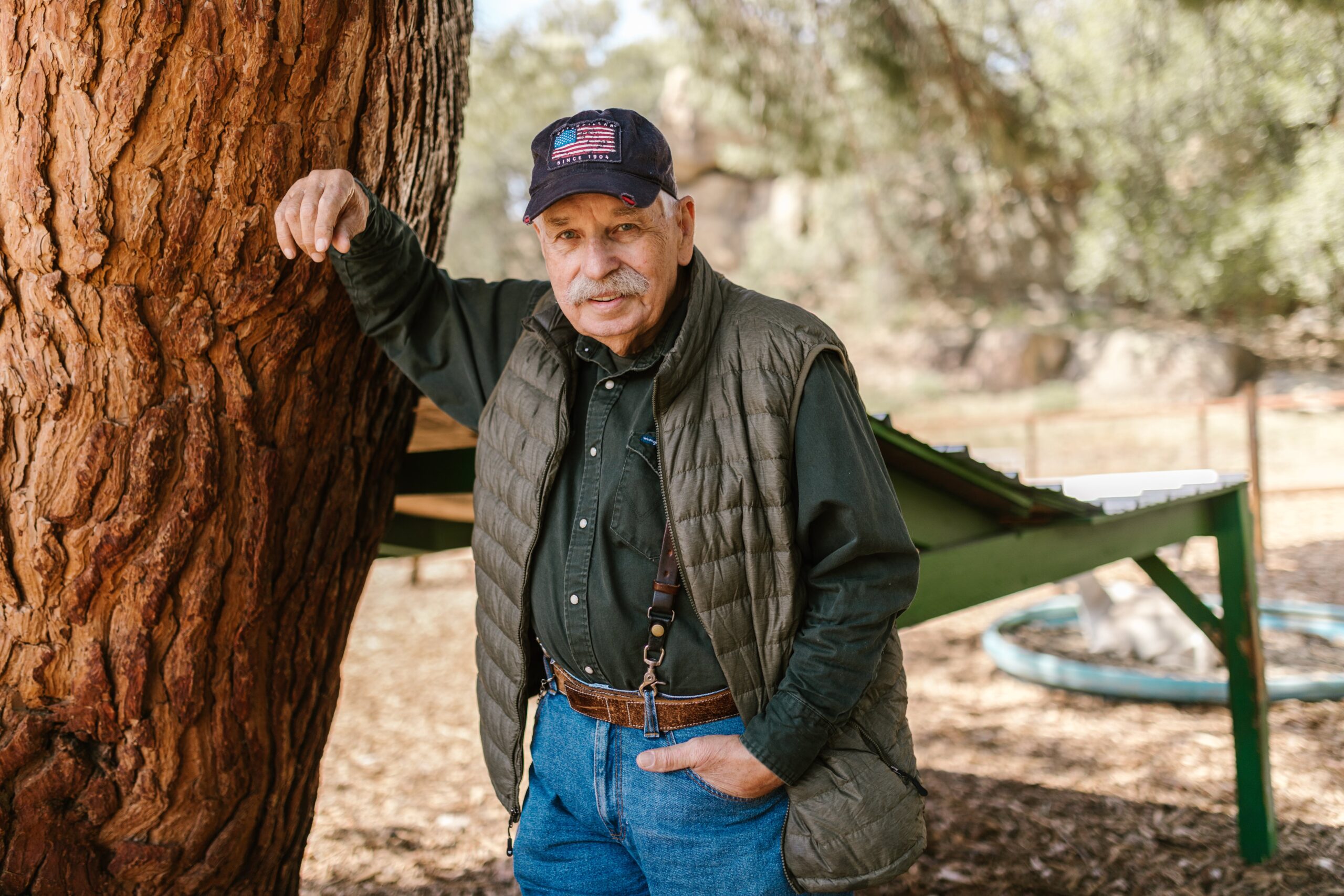 A retired man smiling